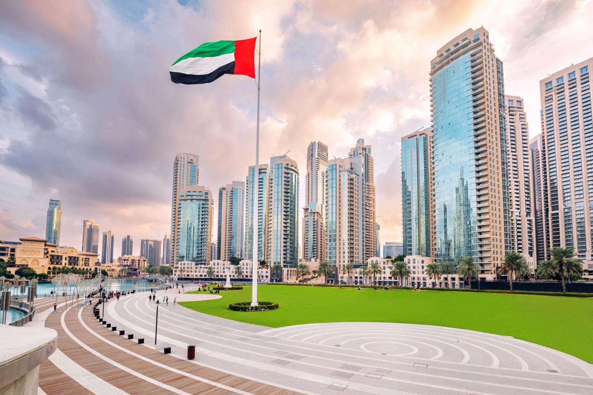UAE flag and a modern Dubai district